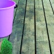 dirty-deck-with-pink-bucket-and-broom