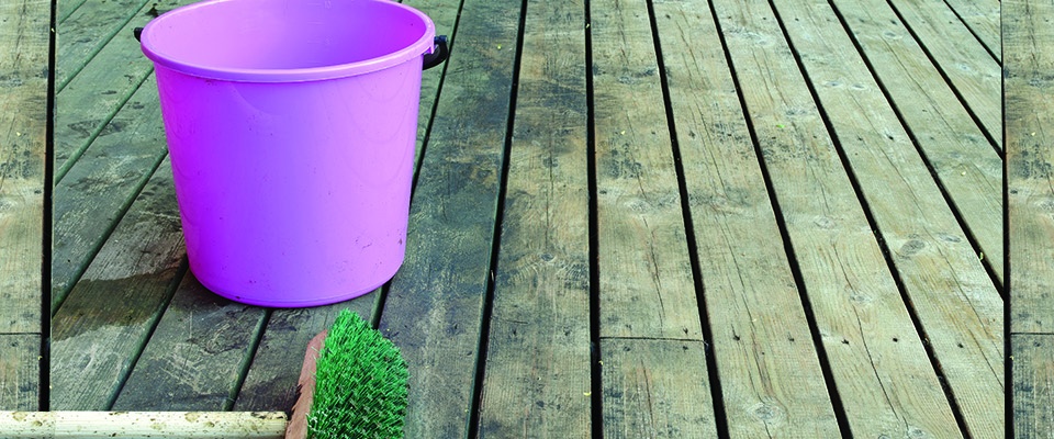 dirty-deck-with-pink-bucket-and-broom